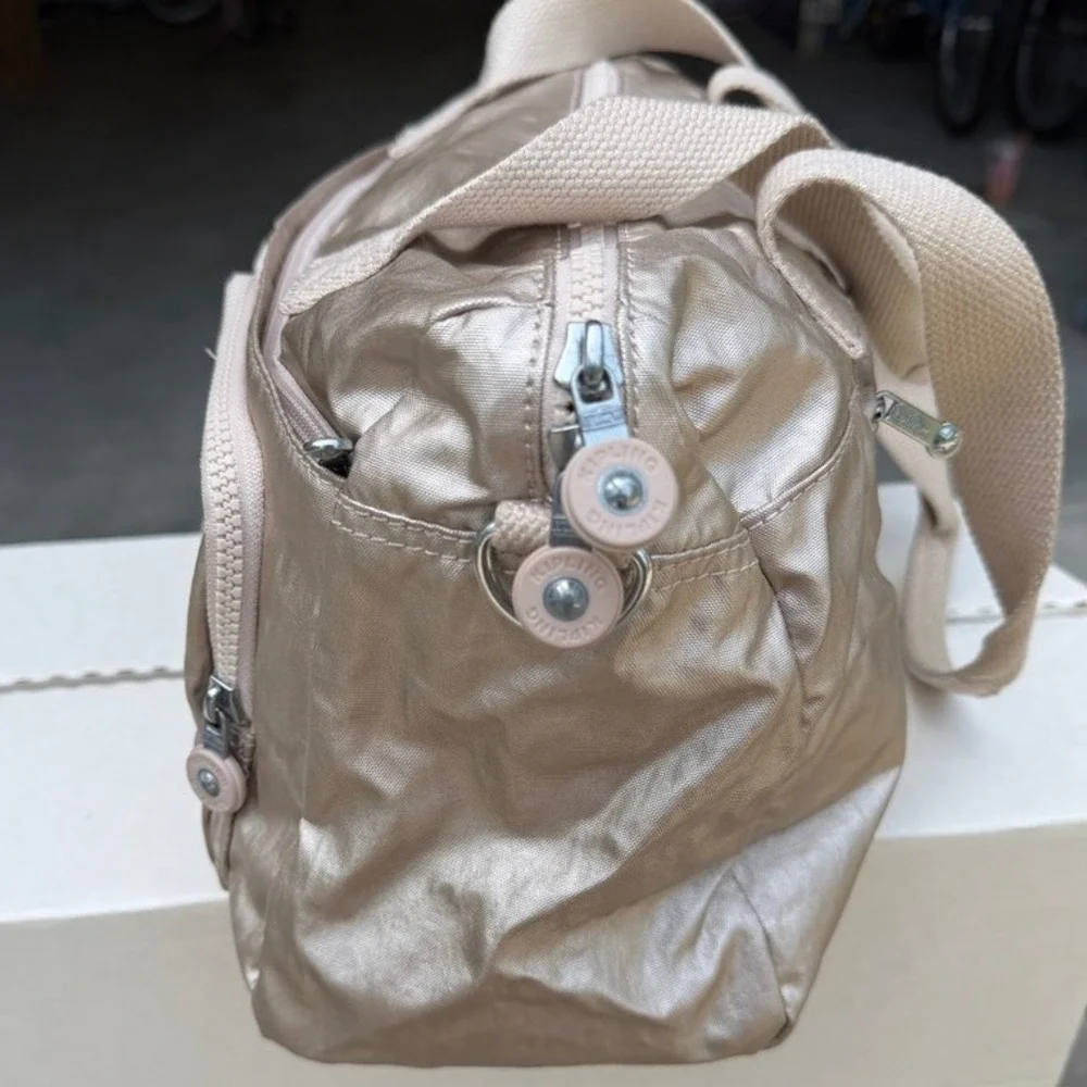 Kipling Cyrene Front Pocket Satchel‎ in Champagne